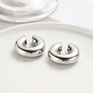 Minimalist silver twist ear cuff pair for non-pierced ears in vintage aesthetic
