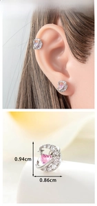 Macro detail of heart zircon moon earring showing 0.94cm dimensions and silver finish
