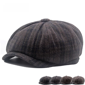 Macro shot of British wool plaid fabric textures and four pattern colors for newsboy caps