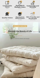 Close-up of thick beige quilted seat cushions with linen texture and soft cotton filling