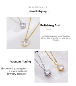 Detail of classic six-prong pendant necklace with polished finish in gold and silver