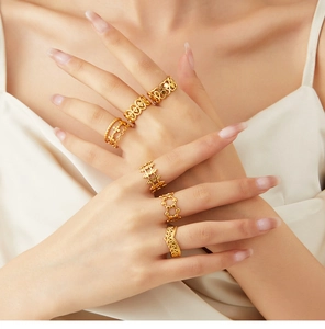 Detail of 18K gold plated hollow floral ring showcasing its intricate French vintage layers