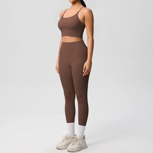 Women's brown seamless yoga set with thin strap sports bra and high-waist leggings
