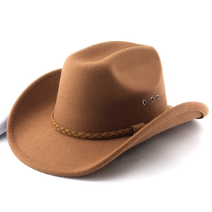 Detail of camel wool western cowboy hat with metal eyelets and braided band decoration
