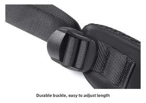 Detail of durable black nylon strap with adjustable plastic buckle on the backpack