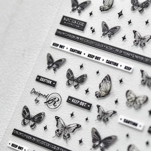 5D embossed dark style butterfly nail stickers with gothic text and warning tape design