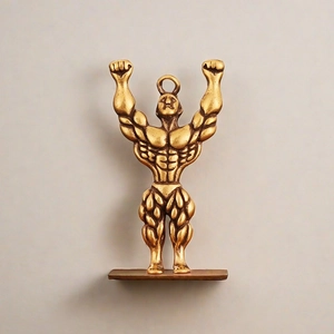 Handmade brass bodybuilder keychain figurine showing muscular detail and power pose