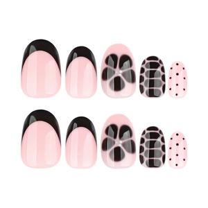 Faux ongles French rose et noir avec motifs fleurs et pois, forme ovale et brillante