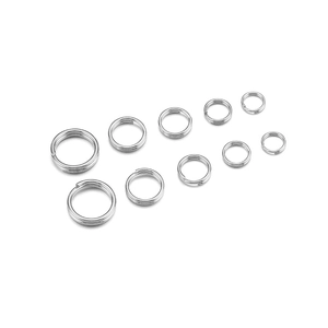 Macro detail of various sizes of stainless steel double open jump rings for jewelry making