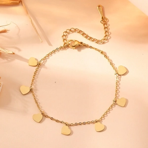 Bracelet en acier inoxydable doré à breloques cœurs avec chaîne réglable et fermoir