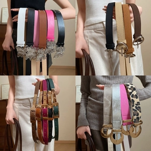 Variety of thin leather belts with round rivet buckles in multiple colors and designs