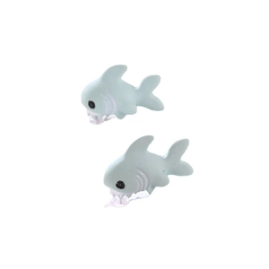 Close-up of cute mint green shark earrings with painted details on a white background