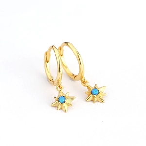 925 silver gold star earrings featuring blue opal star pendant on white background