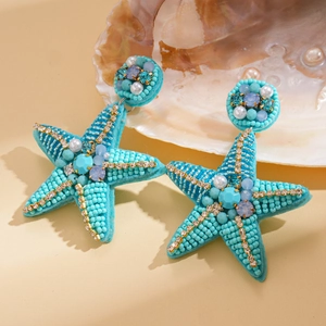 Starfish drop earrings with turquoise beadwork and pearls for beach vacation style