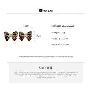 Detail showing tortoise shell bow earrings with dimensions and rhinestone features