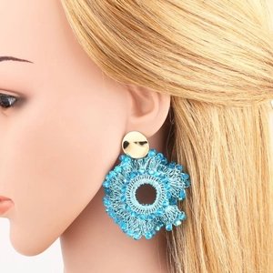 Handmade bohemian turquoise beaded hoop earrings with gold studs and fringe detail