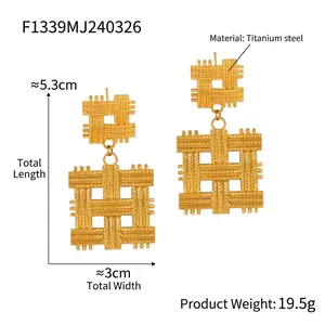 Detail of gold titanium steel earrings with square woven texture and dimensions