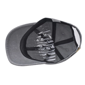 Inside view of washed cotton short brim cap with sweatband and metal adjustment buckle