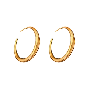 Minimalist golden C-shape stud earrings with polished round metal finish on white background