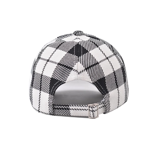 Detail view of houndstooth baseball cap with metal buckle and adjustable back strap