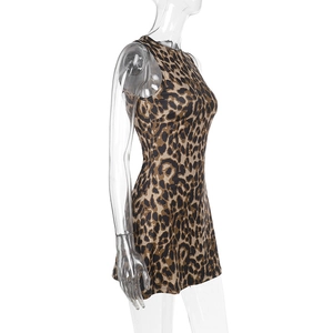 Side view of leopard print sleeveless mini dress on mannequin with slim fit design