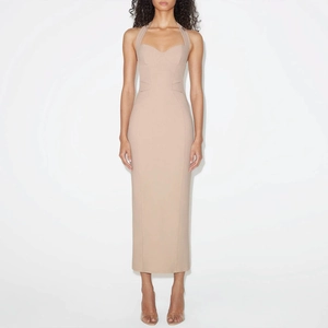 Detail view of the elegant heart-shaped halter neckline on this slim fit nude maxi dress
