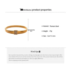 Detailed specs of the gold titanium steel bangle with inlaid crystals and measurements