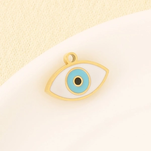 Macro shot of 18K gold-plated stainless steel Evil Eye pendant with blue enamel inlay