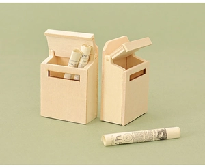 Detailed macro view of miniature wooden dollhouse mailboxes with rolled paper props