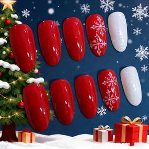 Christmas long almond press-on nails featuring red glitter and white snowflake patterns