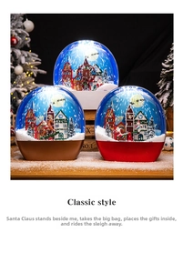 Detailed view of snow globe lights with Santa and reindeer for Christmas desktop decor