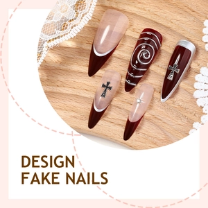 Gothic burgundy press-on nails with silver metallic crosses and French tips