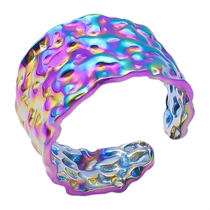 Detailed close-up of rainbow gradient hammer textured stainless steel adjustable ring