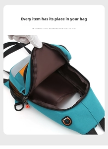 Detail view of the durable canvas chest bag showing the interior compartment and lining