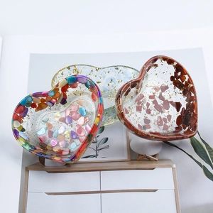 Handmade heart-shaped resin trinket bowls with natural crushed crystals and gold foil