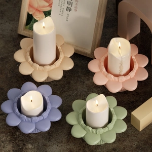 Lotus flower resin candle holder molds in pastel colors with LED tea light candles