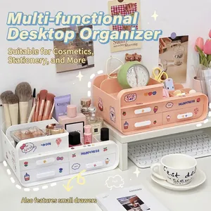 Modern pink and white desk organizer with drawers and stickers for office or cosmetics