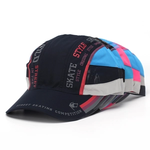 Close-up of quick-dry baseball caps with mesh panels and street skating lettering