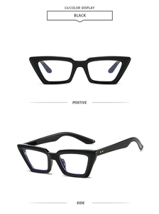 Dettaglio di occhiali da sole cat-eye neri con rivetti dorati e lenti anti-luce blu
