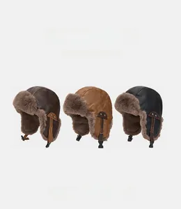 Detail view of winter pilot hats in three colors with thick faux fur and premium PU leather