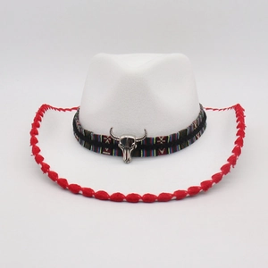Macro view of white felt jazz hat featuring ethnic woven band and silver bull head detail