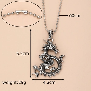 Macro detail of a silver dragon pendant with 60cm bead chain and size specifications