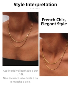 Detail of 18K gold-plated stainless steel layered snake and twisted rope chains necklace