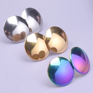 Macro view of geometric 304 stainless steel earrings in silver, gold and rainbow finish