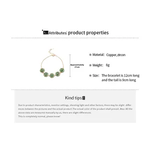 Detail view of 18k gold plated bracelet with five green zircon flower charms and chain length