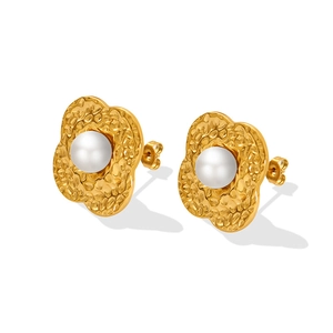 Irregular textured gold flower earrings with white pearls in elegant 18k plated finish