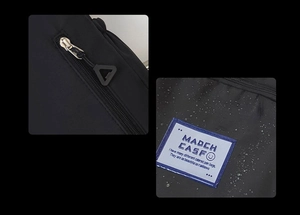 Close-up of waterproof fabric with water beads and a hidden anti-theft zipper pocket