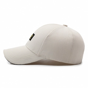 Classic beige cotton baseball cap with side patch detail and reinforced brim