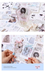 Detail of ballet-themed stickers with ribbon patterns for DIY journaling and scrapbooking