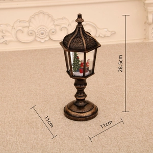 Close-up of bronze vintage Christmas snow globe lamp showing 28.5cm height dimensions